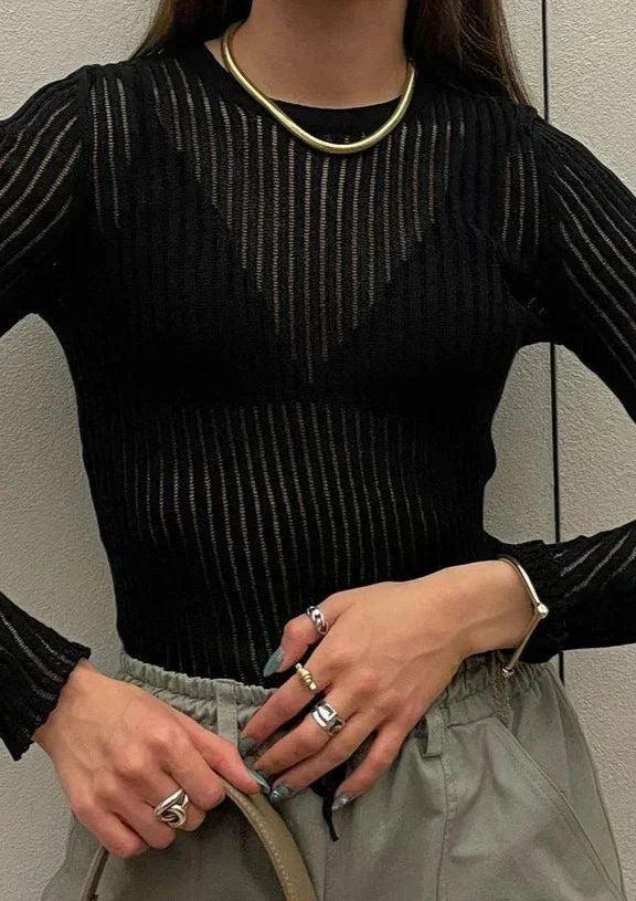 Sheer ribbed long sleeve top for women. Perfect for casual wear, elegant evenings, or chic layering fashion.