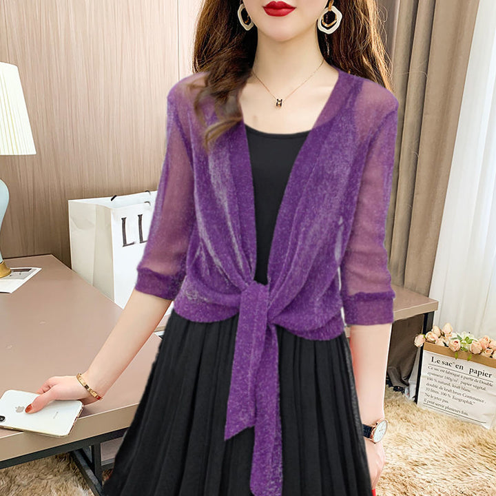 Stylish women's sheer crop top with front tie, half sleeve, adding an elegant touch to summer outfits.