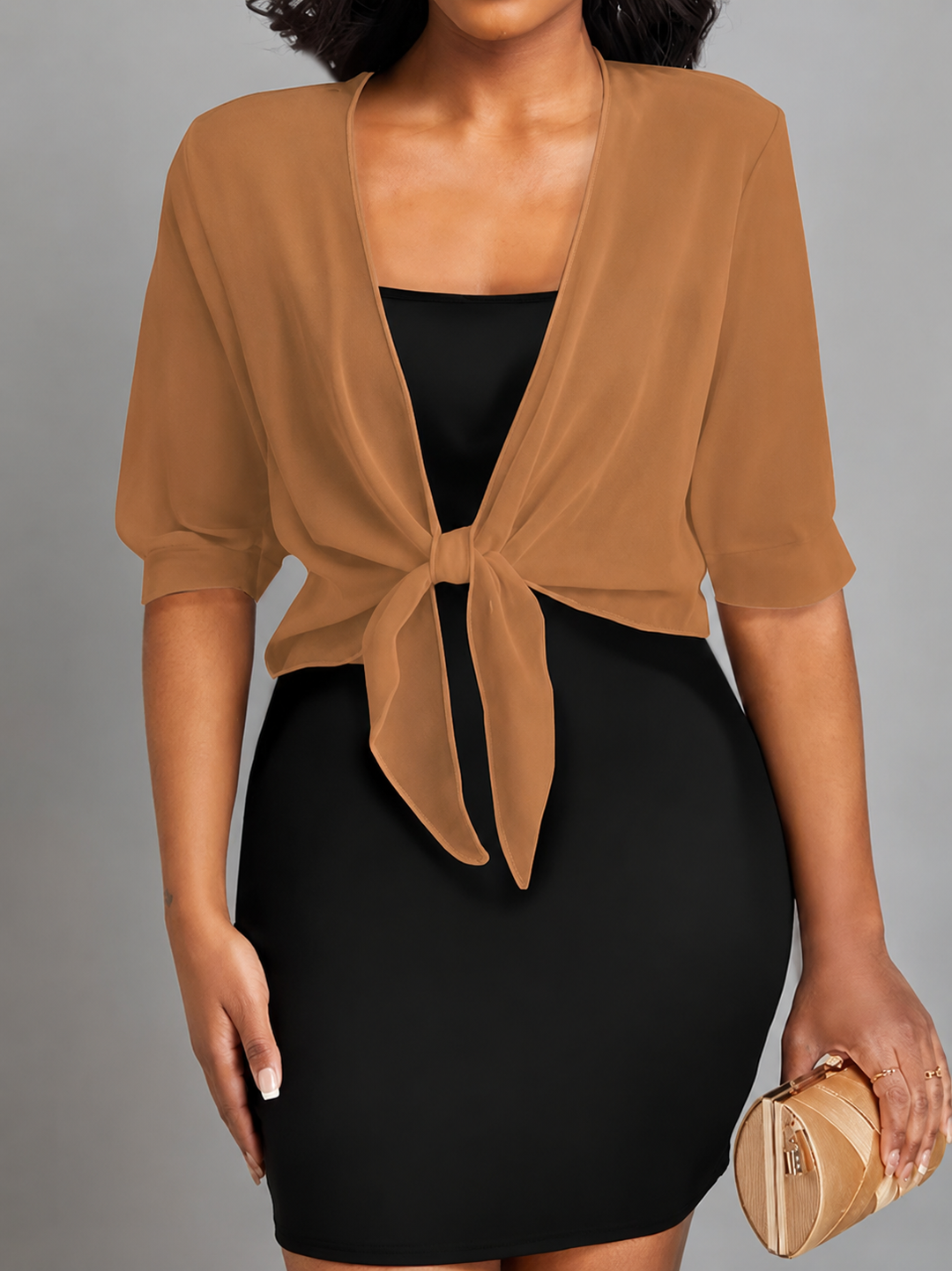 Elegant women's sheer half-sleeve cropped top with tie front detail, perfect for stylish layering.