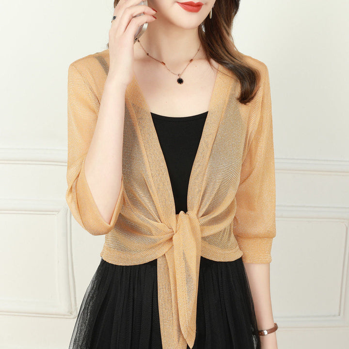 Sheer tie-front women's cropped top, half sleeve, ideal for elegant layering in summer or special events.