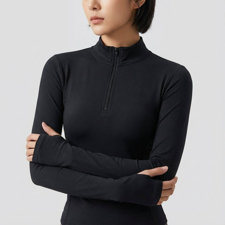Sporty chic women's half-zip knitted long sleeve top in blue, side view, ideal for autumn casual wear.