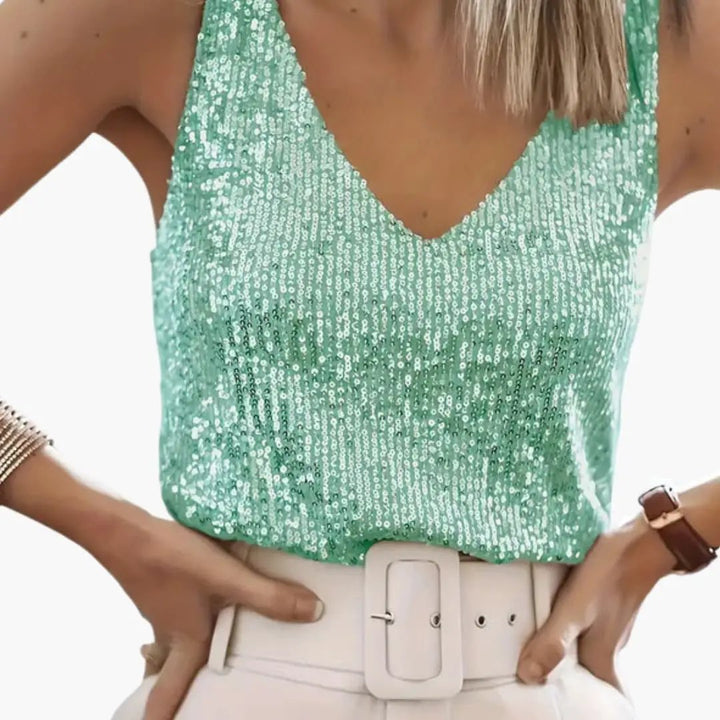 Women's shimmer sequin tank top with a round neck. Perfect party wear, sleeveless for summer style.