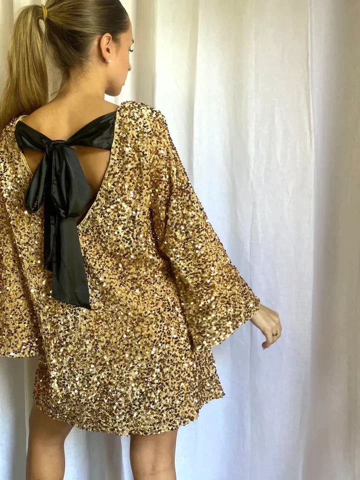 Women's glitter midi party dress, a shimmering and elegant choice for evening events and formal occasions.
