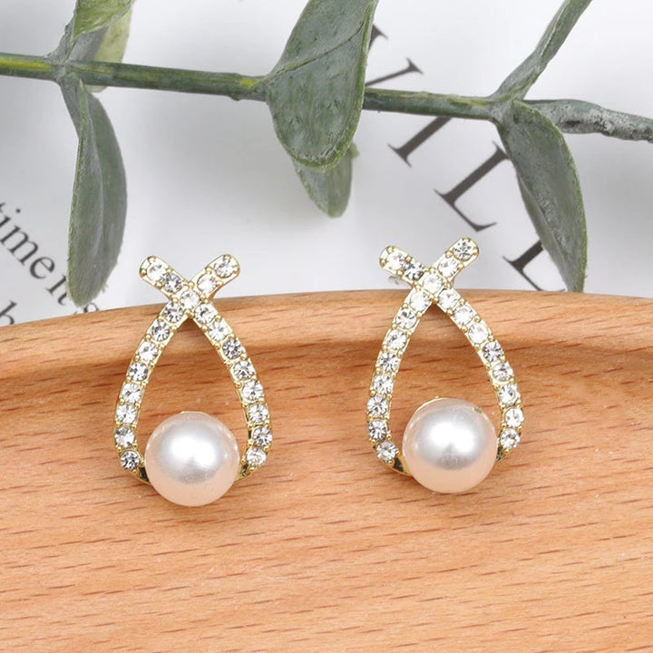 Beautiful women's glitter pearl drop earrings, designed to shimmer and sparkle. Elegant jewelry for women.
