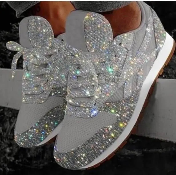 Women's shimmering glitter sequin sneakers, offering dazzling style & comfortable wear for fashion-forward women.