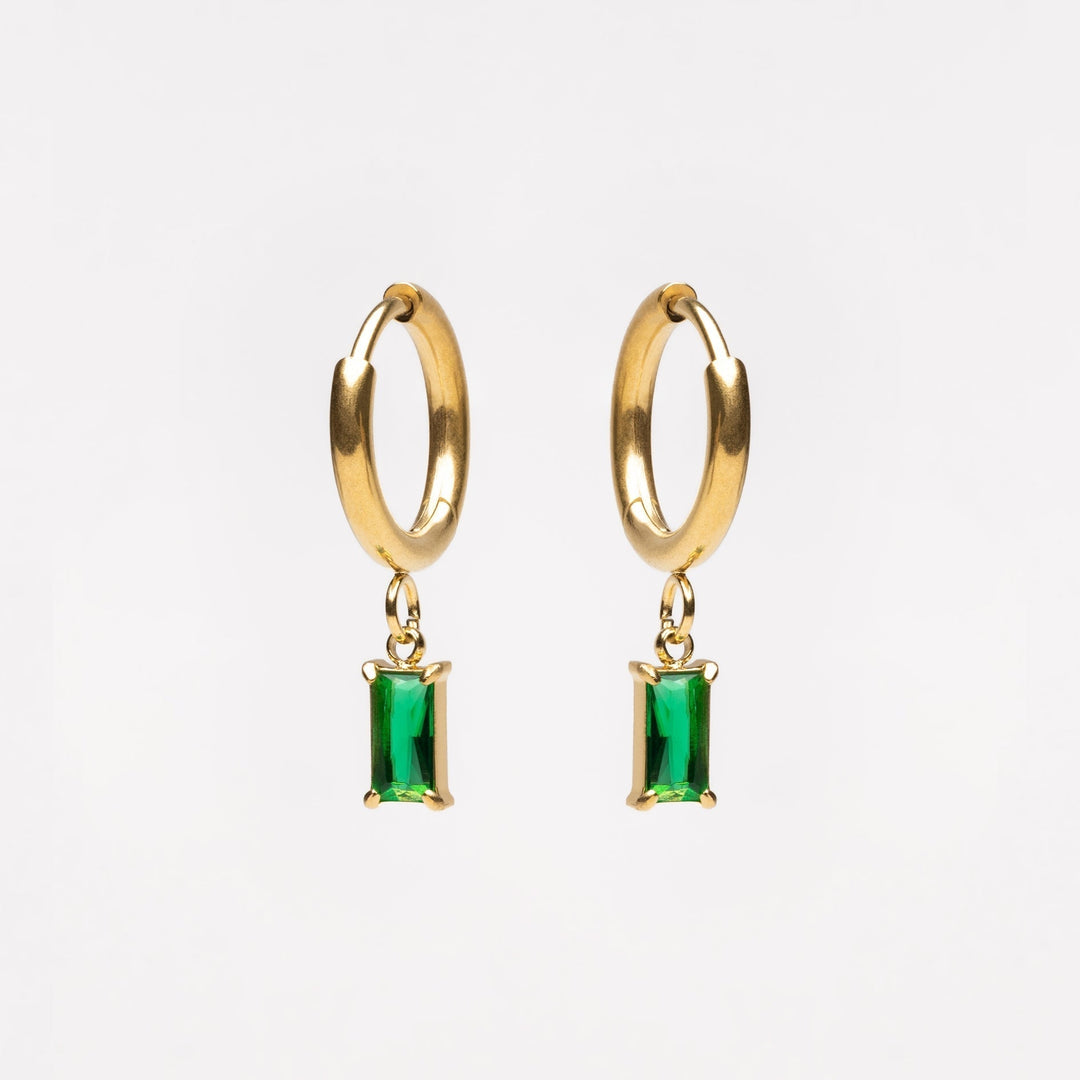 Pair of Liana shimmering ocean drop earrings. Women's elegant crystal dangle jewelry with sparkle.