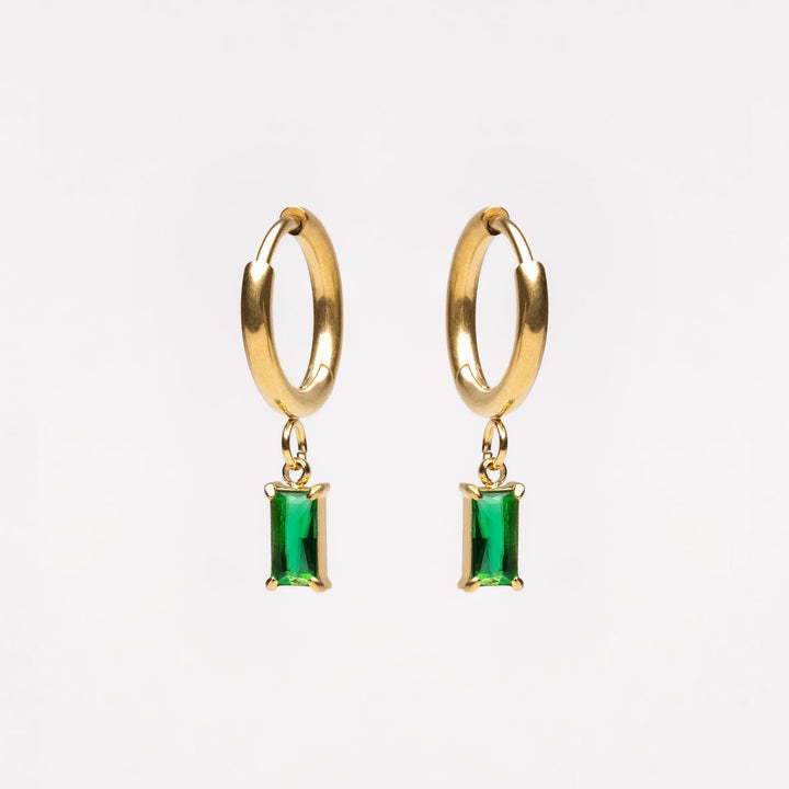 Pair of Liana shimmering ocean drop earrings. Women's elegant crystal dangle jewelry with sparkle.