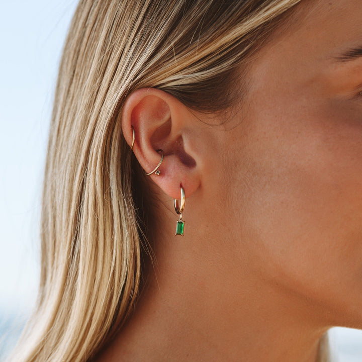 Women's elegant ocean blue drop earrings with shimmering crystals. Stylish dangle jewelry.