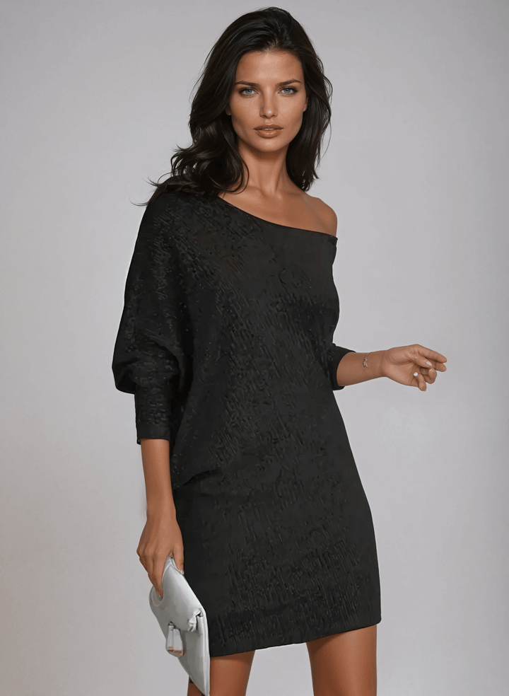 Glamorous women's sequin cocktail dress. Ideal for festive nights out & elegant events.
