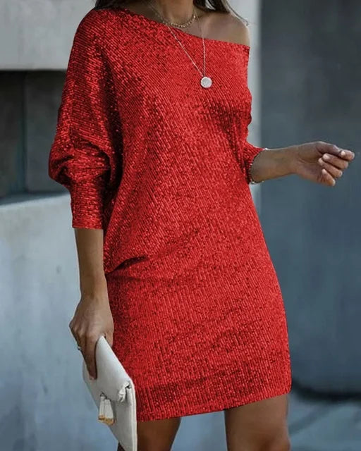Shimmering sequin mini dress for women. Features a chic cut, perfect for dancing & parties.