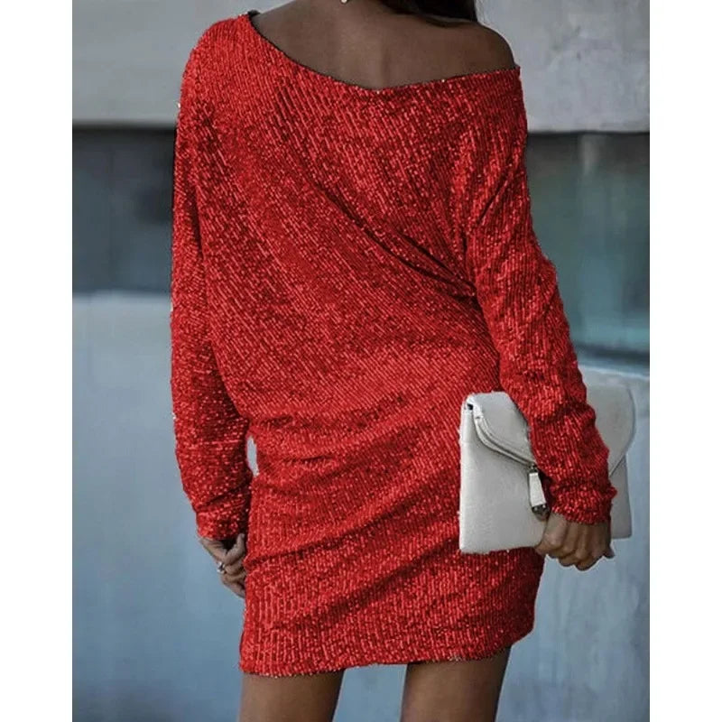 Chic women's shimmering sequin dress. Versatile mini style for cocktail parties & night outs.