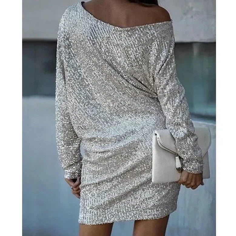 Luxurious women's sequin evening mini dress, offering a glamorous shimmer for special occasions.