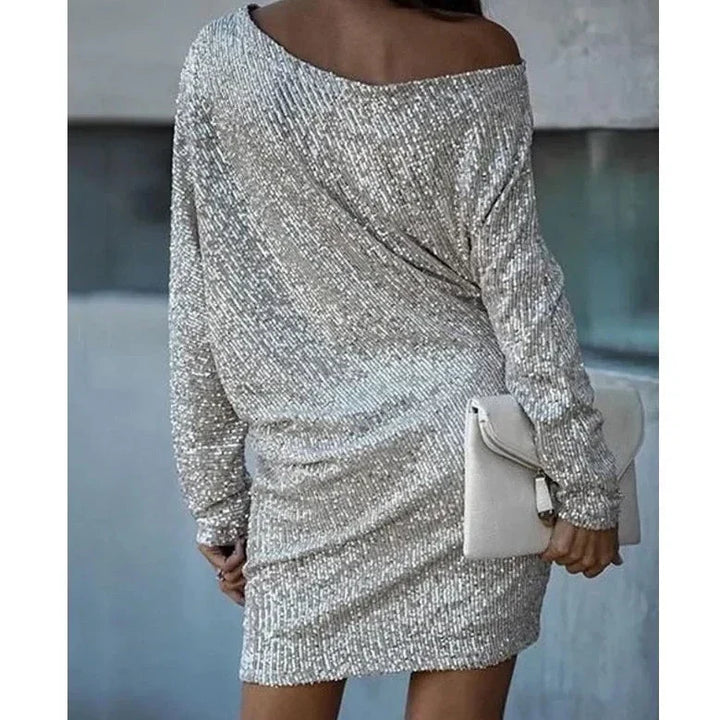 Luxurious women's sequin evening mini dress, offering a glamorous shimmer for special occasions.