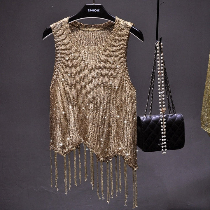 Women's shimmering sequined top in a dazzling gray-gold hue, perfect for party wear, night out, or special occasions.