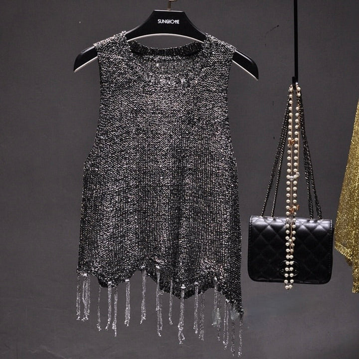 Glamorous women's sequined top, sparkling in gray and gold, ideal for evening wear, cocktail parties, and dazzling style.