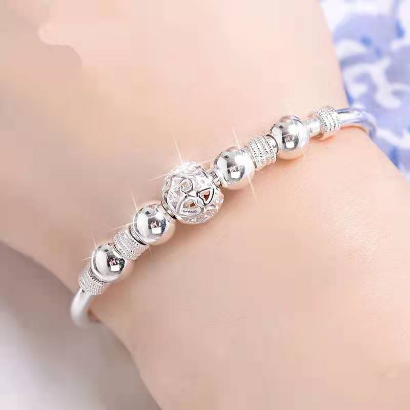 Hypoallergenic silver beaded bracelet for women, sparkling luck beads.
