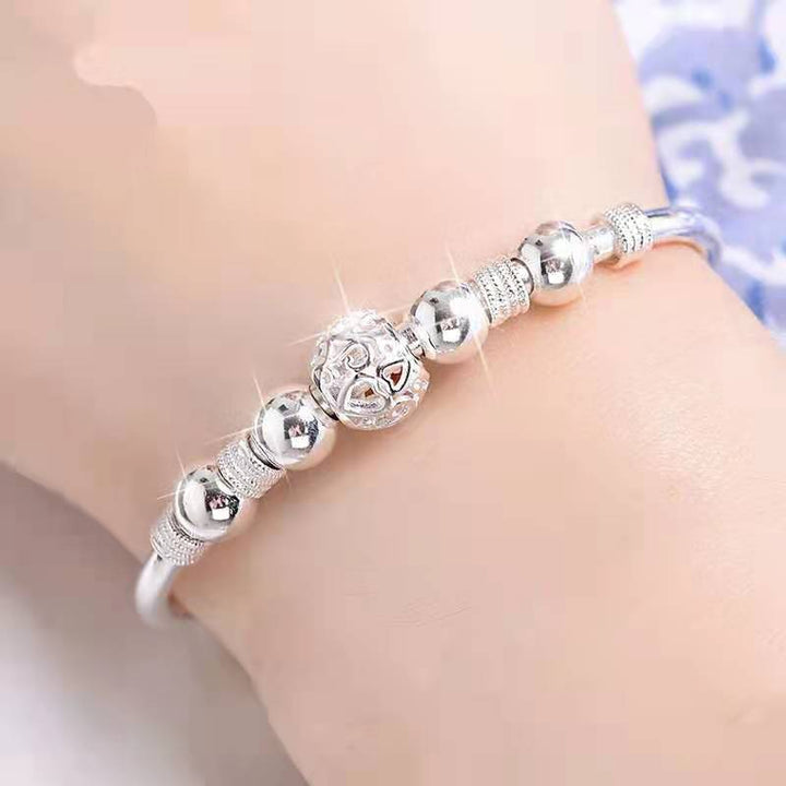 Hypoallergenic silver beaded bracelet for women, sparkling luck beads.