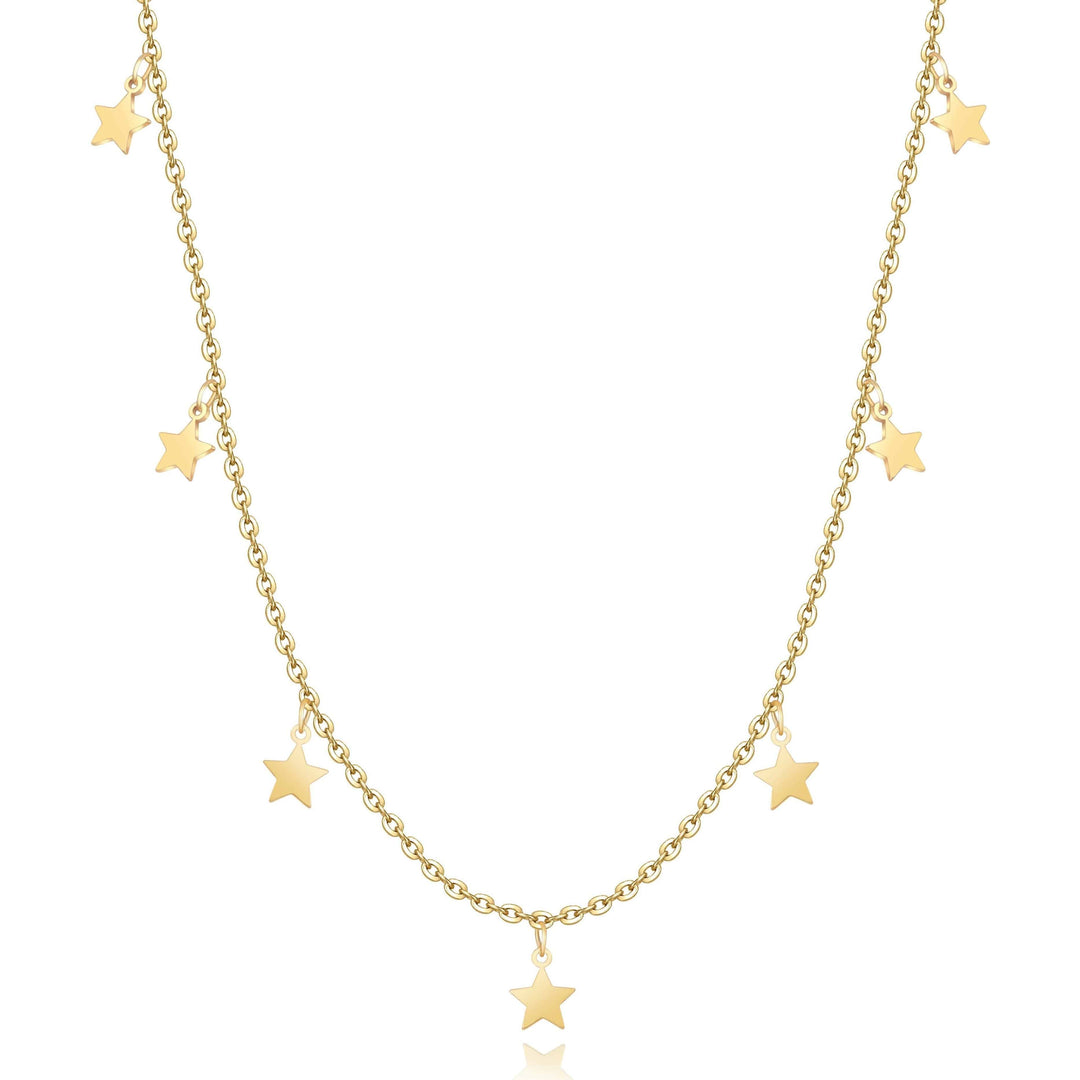 Close-up of shimmering star necklace for women, gold plated & silver delicate celestial jewelry.