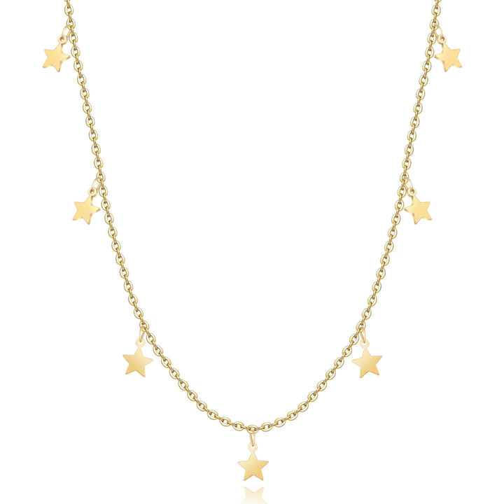Close-up of shimmering star necklace for women, gold plated & silver delicate celestial jewelry.