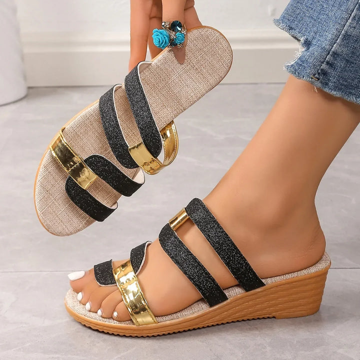 Comfortable triple-strap flat sandals for women, shimmering for summer outings.