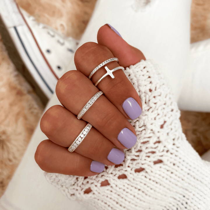 Stylish women's sterling silver ring with brilliant cubic zirconia stones.