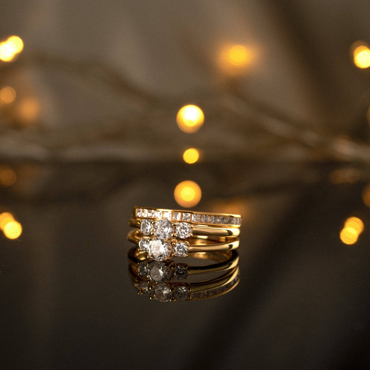 Close-up of a women's elegant sterling silver ring with a shimmering zirconia stone.
