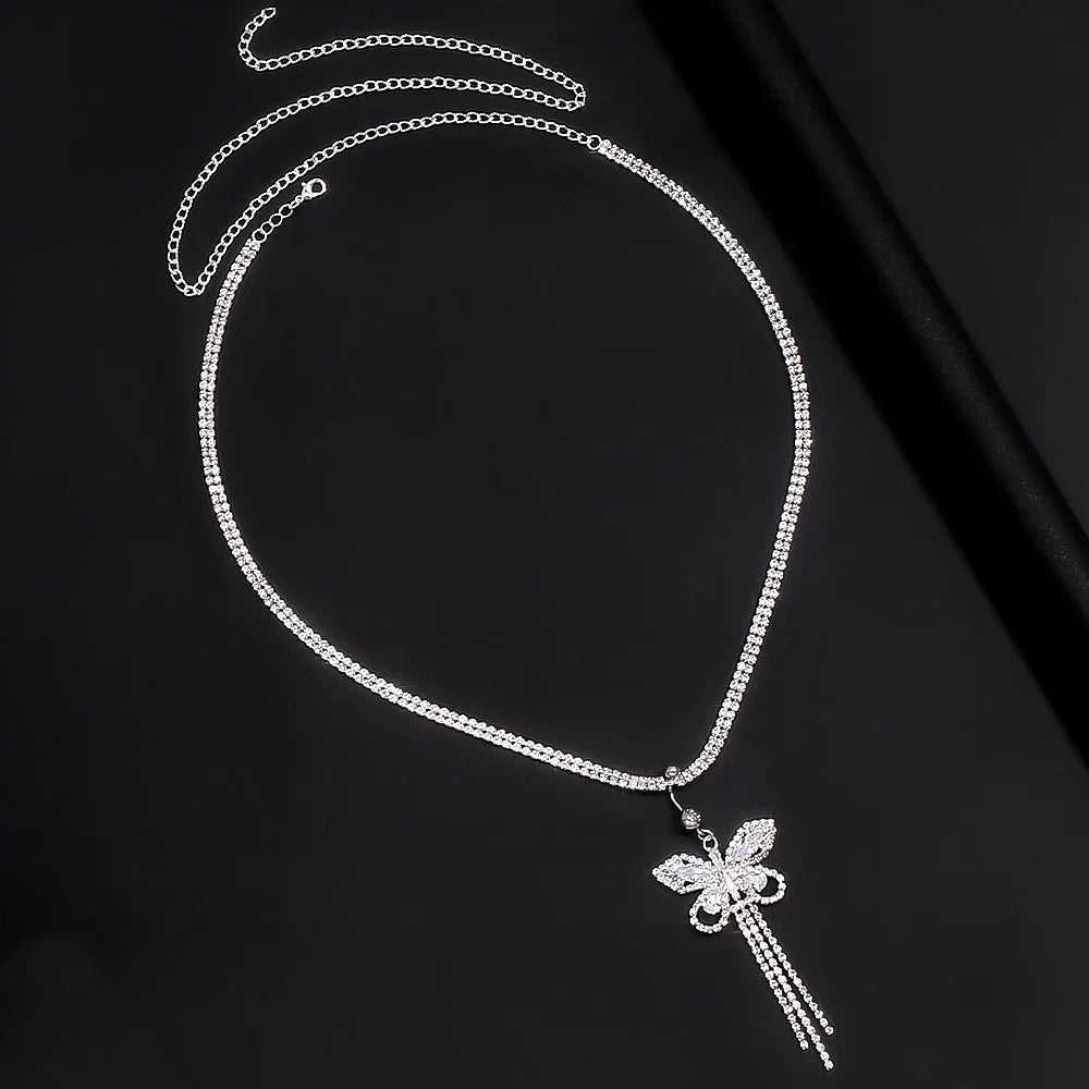 Dazzling women's body chain featuring rhinestone butterflies, a chic and sparkling fashion accessory.