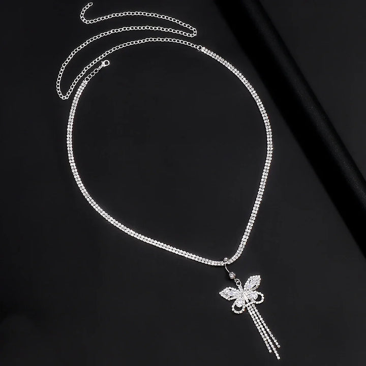 Dazzling women's body chain featuring rhinestone butterflies, a chic and sparkling fashion accessory.