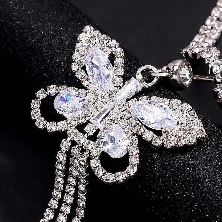 Shiny rhinestone butterfly women's body chain, an elegant accessory adding sparkle to any outfit.