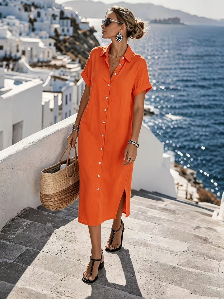Women's short sleeve button-front shirt dress for a chic summer vacation style.