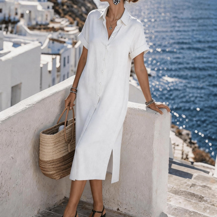 Flowy women's midi shirt dress with short sleeves, perfect for sunny days and travel.