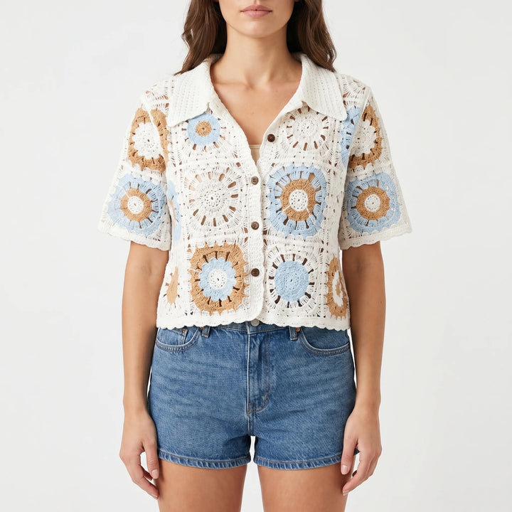 Lightweight open-knit women's short-sleeve crochet cardigan, versatile for summer fashion. Comfortable layering piece.