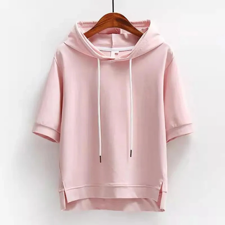 Women's short-sleeve hoodie in relaxed fit, perfect for modern casual wear & spring fashion.