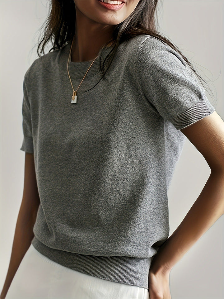 Women's short sleeve knit tee with crew neck & ribbed hem for casual spring/summer style.