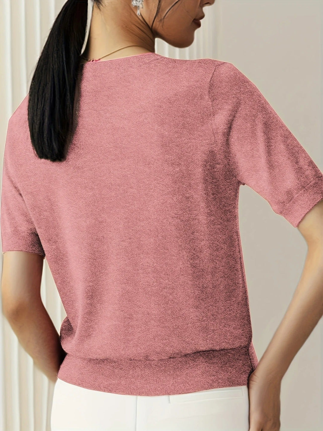 Casual women's short sleeve top, crew neck, ribbed hem. Essential for everyday versatile outfits.