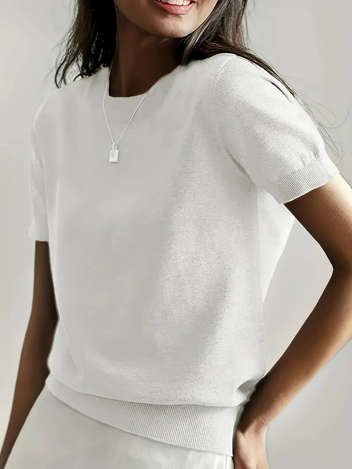 Women's summer essential knit tee, short sleeves, crew neck, ribbed hem. Perfect for casual comfort.