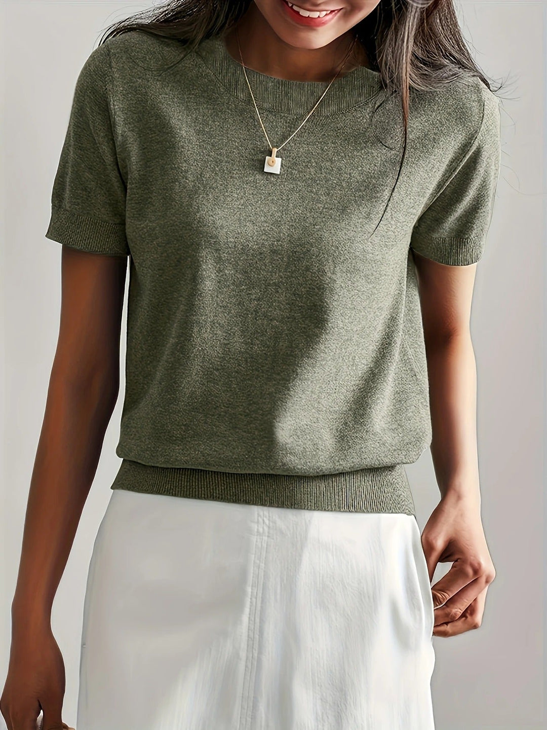 Everyday women's ribbed hem knit tee, short sleeves, crew neck. A chic summer essential.