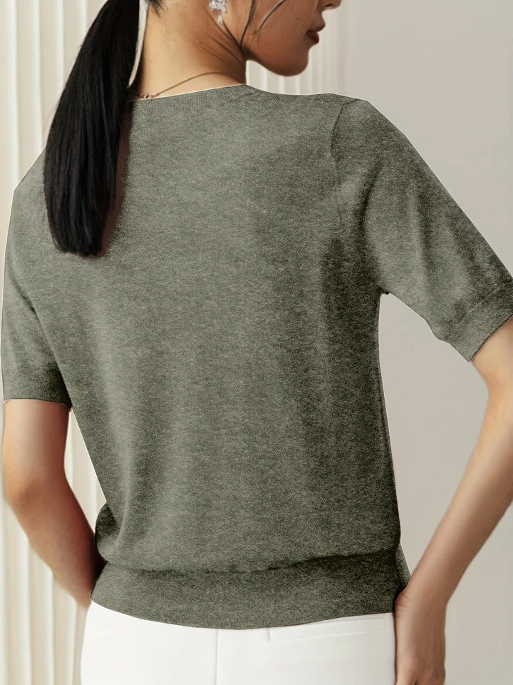 Stylish women's short sleeve crew neck top, knit fabric, ribbed hem. Casual & comfortable.