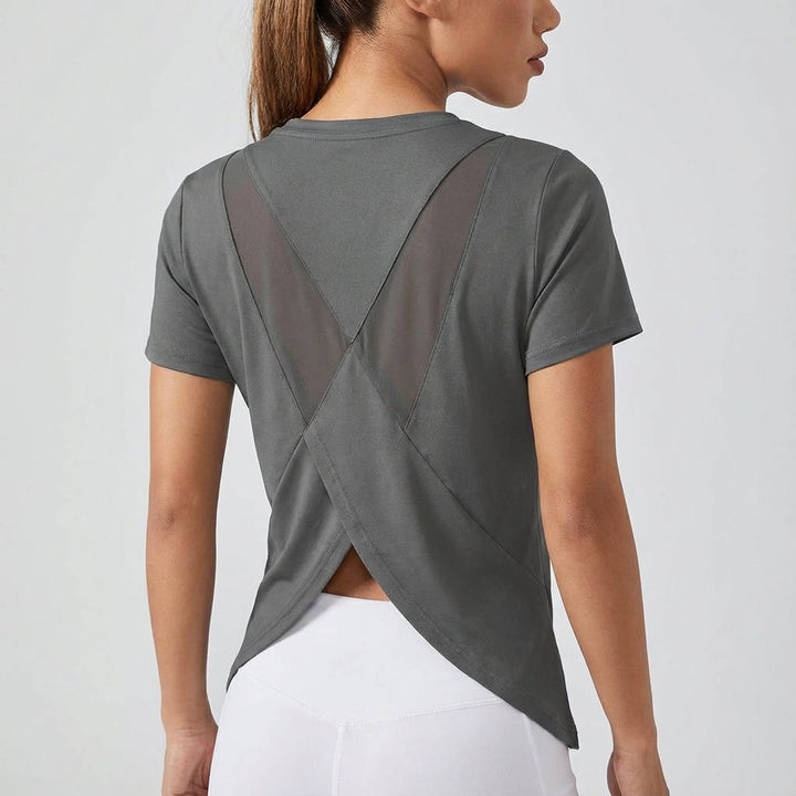 Women's athletic short sleeve top Joyce featuring a functional back cutout for ventilation
