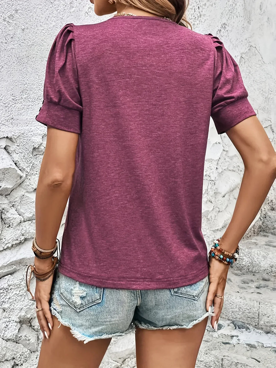 Soft women's ruffle short sleeve top, offering a trendy fit and versatile style for spring and summer.