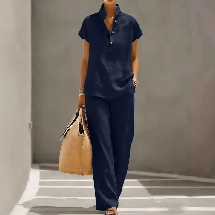 Stylish women's collared short sleeve top & wide leg pants coordinated lounge set for summer comfort.