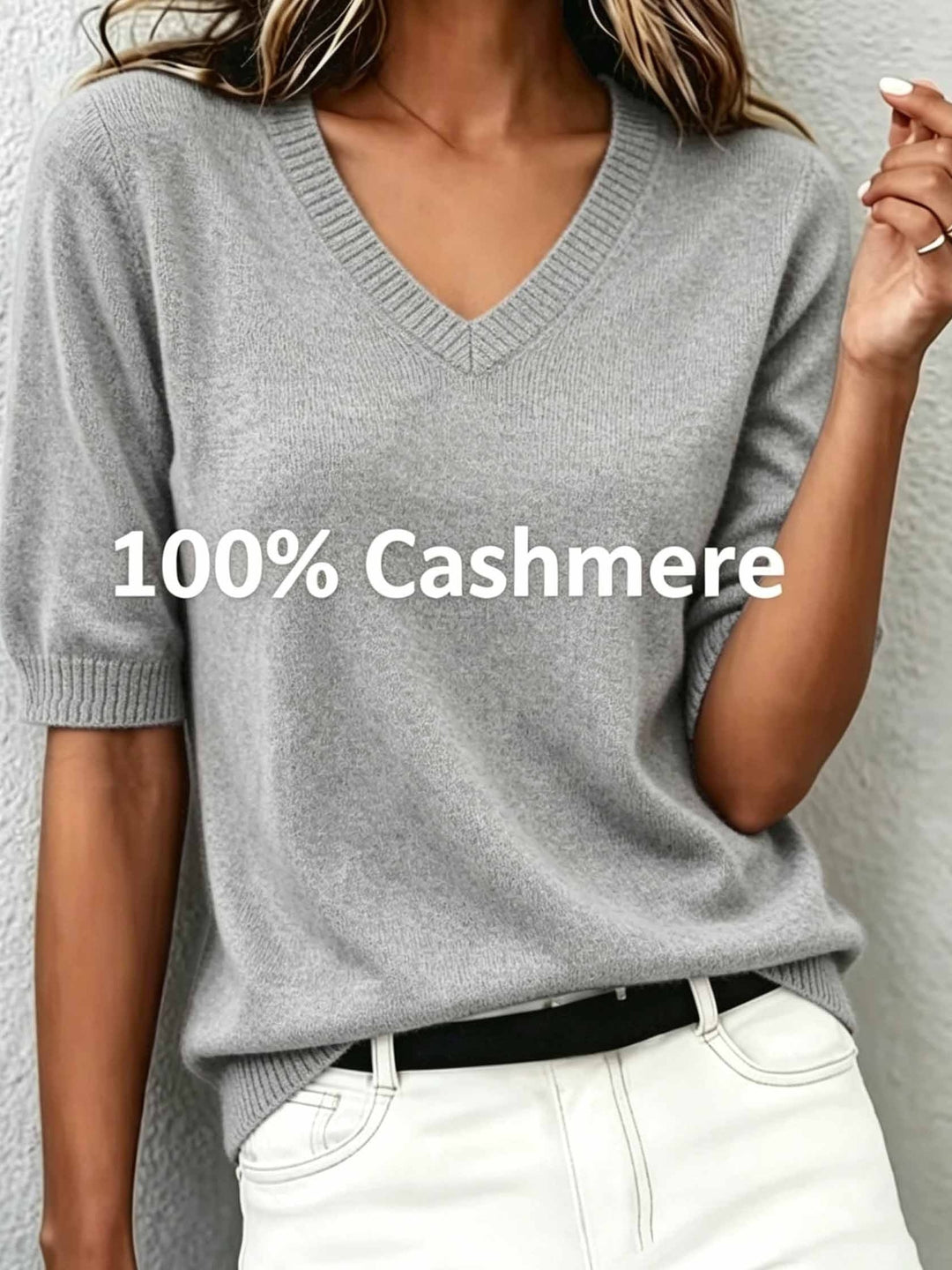 Versatile women's short-sleeve V-neck knitwear, ideal for transitional weather & layering.