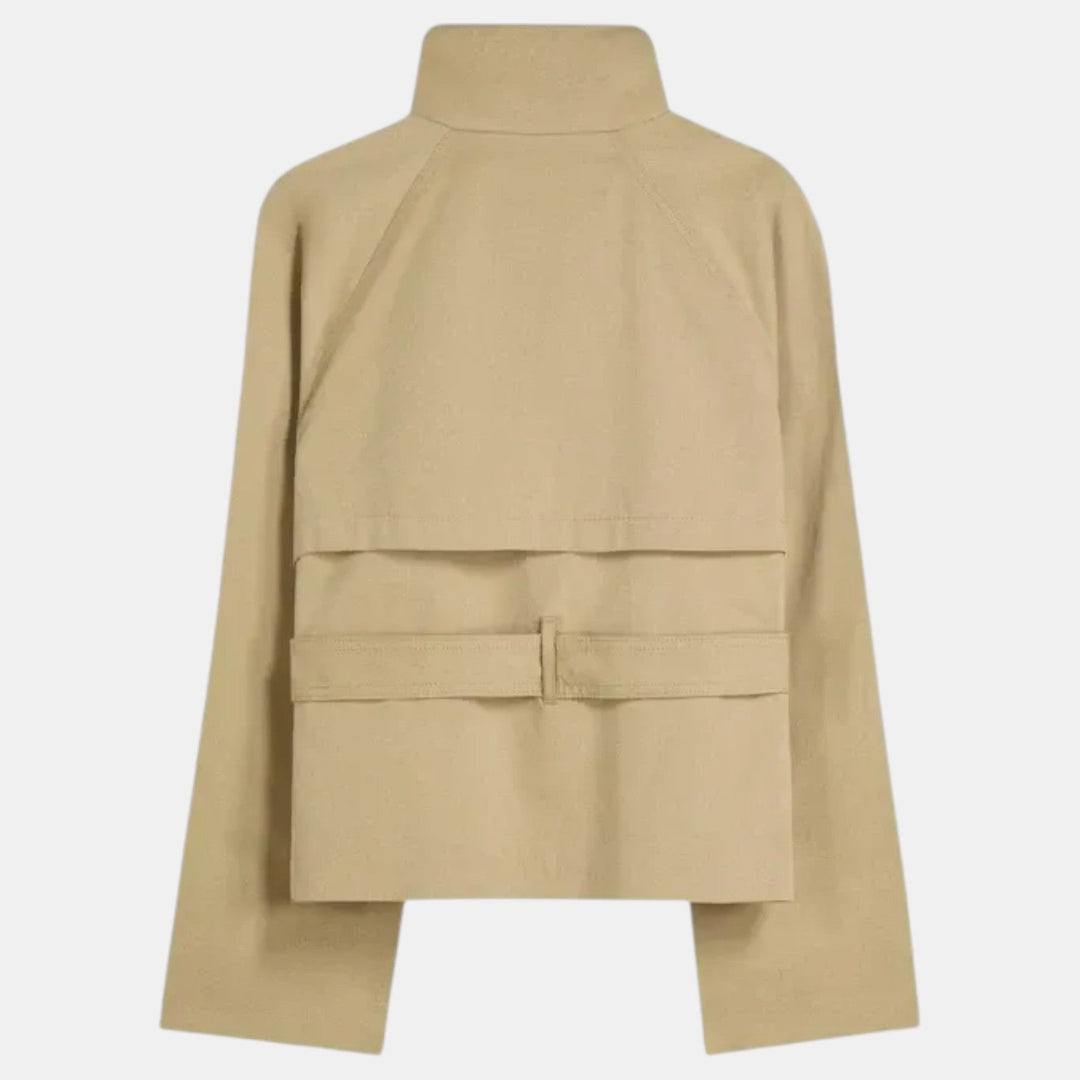 Versatile women's short trench coat with adjustable belt, ideal for workwear or casual outings.