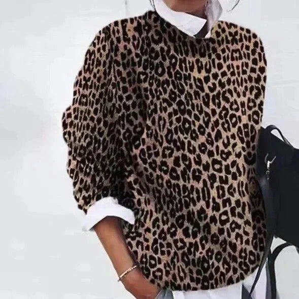 Chic women's patterned pullover sweater. Cozy & stylish long-sleeve winter wear for fall fashion.