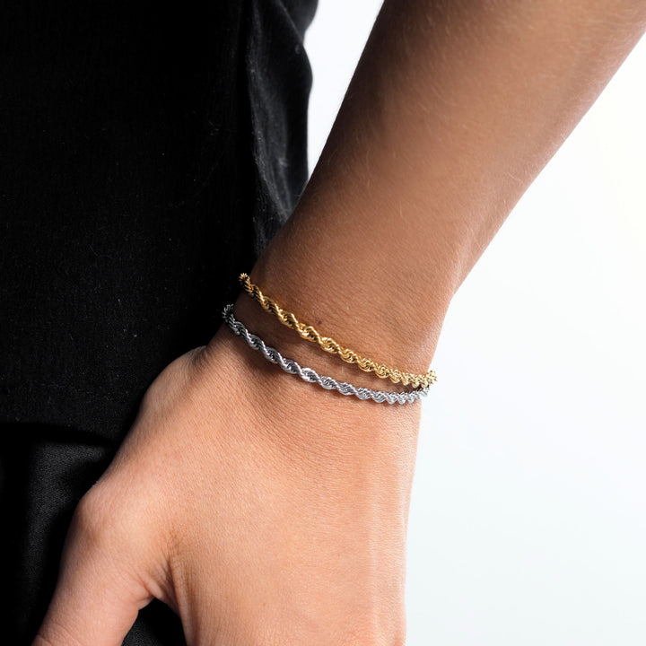 Close-up of Sienna twisted link chain bracelet, showcasing intricate gold links & durable craftsmanship.
