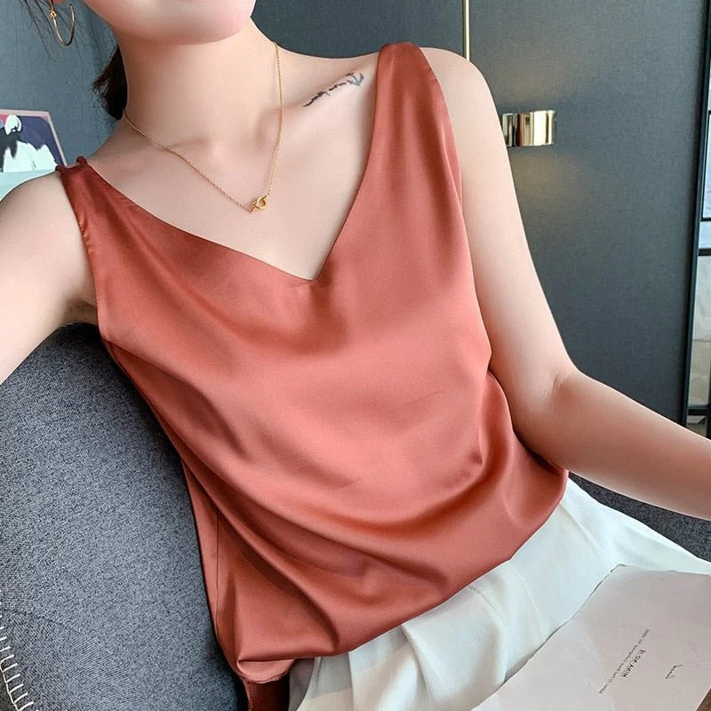Elegant women's sleeveless tank top made from soft, silky smooth fabric, perfect for versatile fashion.