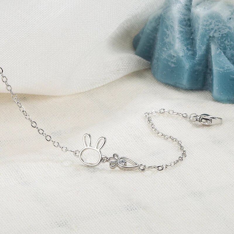 Charming silver rabbit pendant bracelet for women. Adjustable delicate jewelry, a whimsical gift idea.