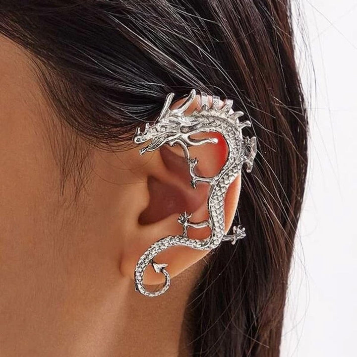 Women's silver dragon drop earrings, featuring intricate mythical dragon design. Perfect statement animal jewelry gift for her.