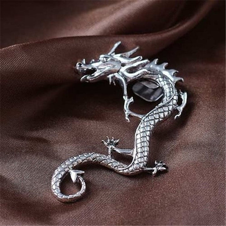 Elegant women's silver dragon drop earrings. Mystical animal jewelry, ideal for a statement look or as a unique gift.
