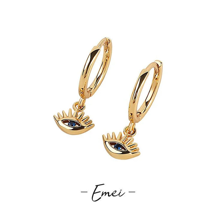 Statement women's evil eye earrings with silver and gold plating. Stylish protection jewelry, perfect gift.